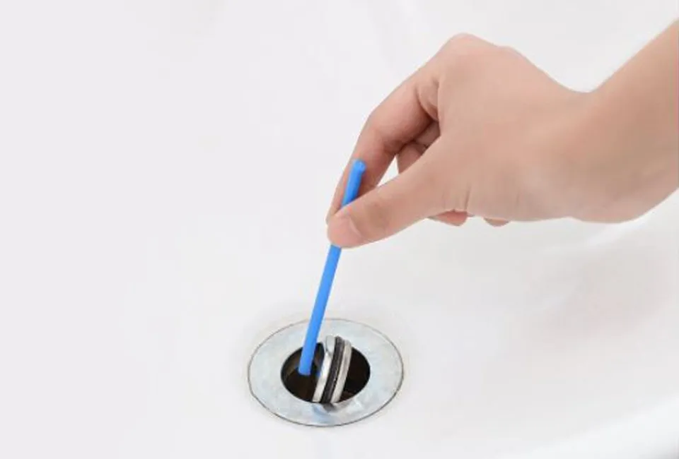 Practical maintenance sticks for effective drainage