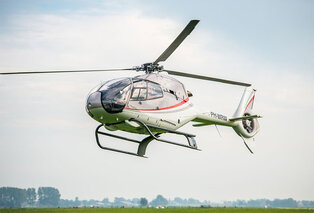 Helikoptervlucht, slipcursus of sportwagen