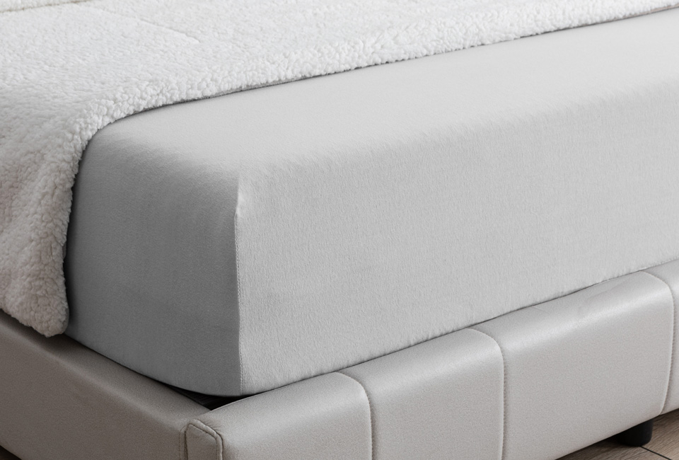 Draps-housses en jersey : 1 + 1 gratuit