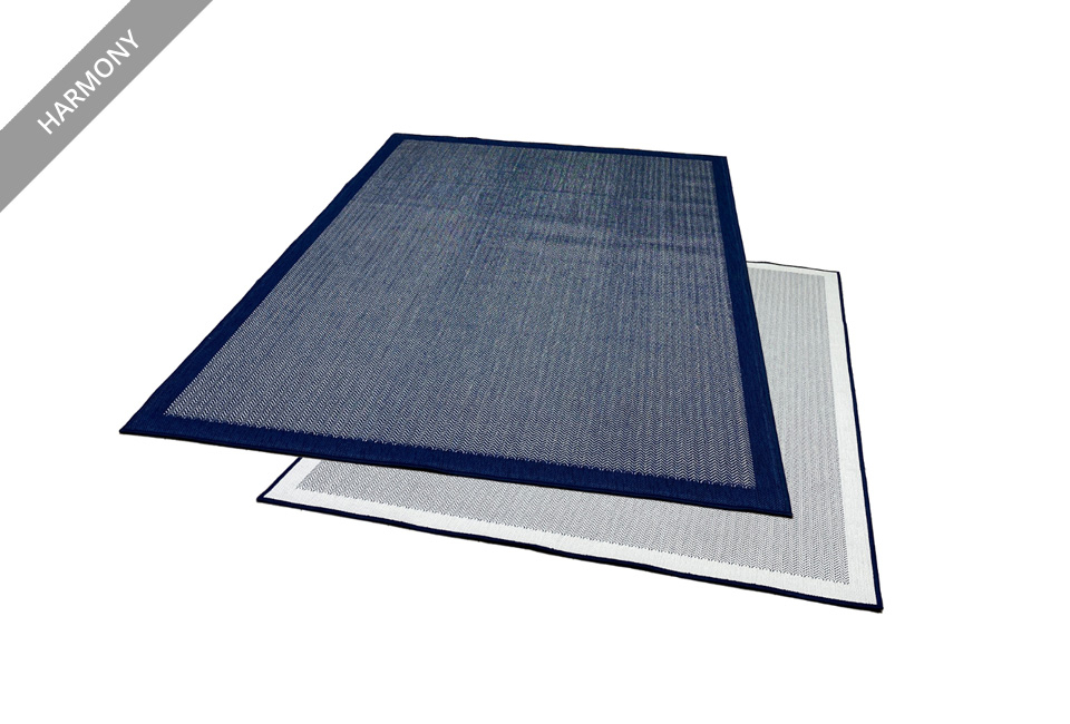 Tapis avec un design réversible pour l'intérieur et l'extérieur