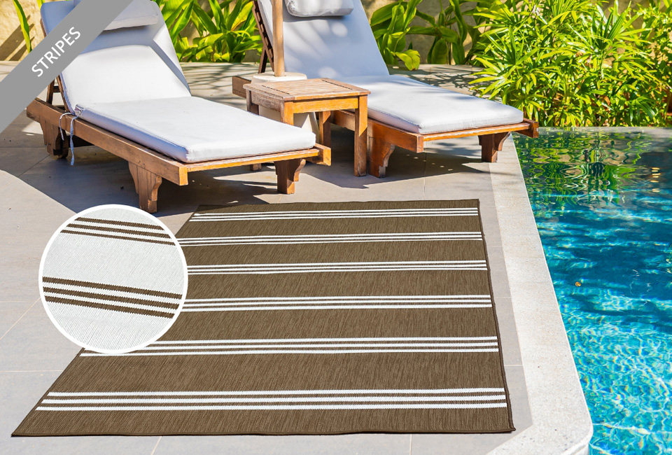 Tapis avec un design réversible pour l'intérieur et l'extérieur