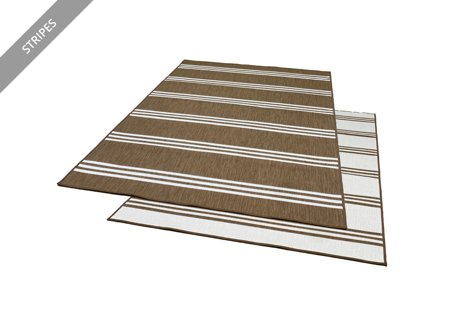 Tapis avec un design réversible pour l'intérieur et l'extérieur