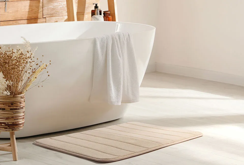 Tapis de bain doux et antid&eacute;rapant