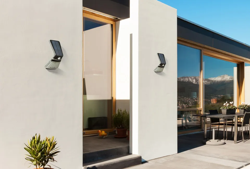 Solar-powered LED wall lamp with motion detector