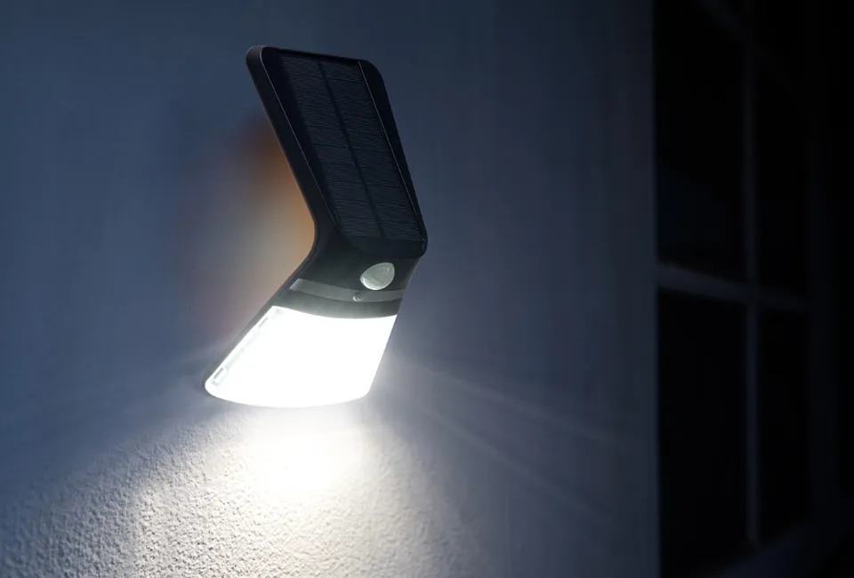 Solar-powered LED wall lamp with motion detector