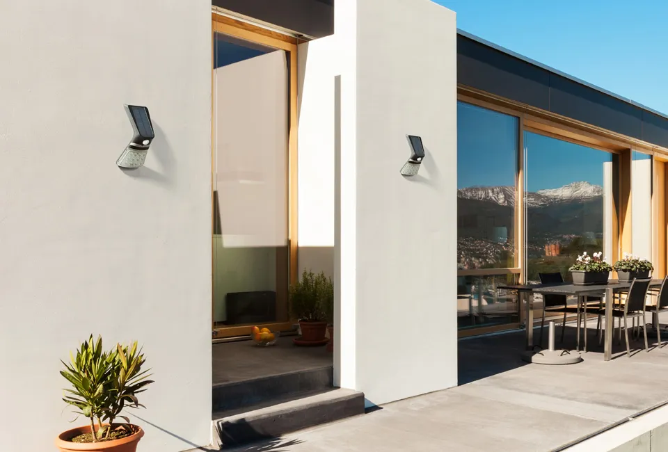 Solar-powered LED wall lamp with motion detector