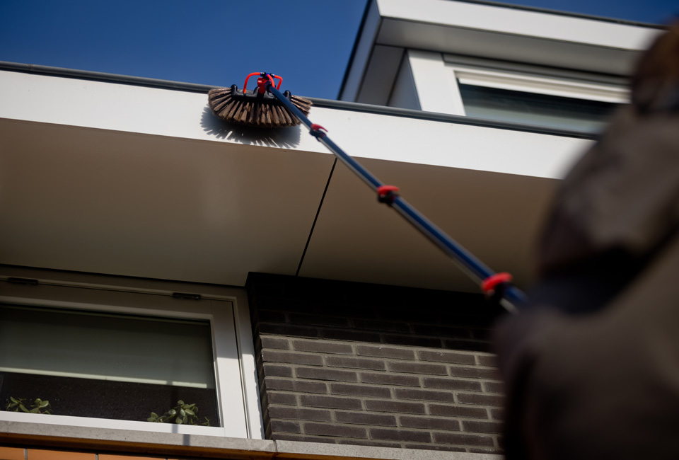 Extra lange telescopische waterborstel