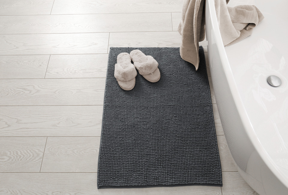 Zachte chenille badmat met antisliplaag