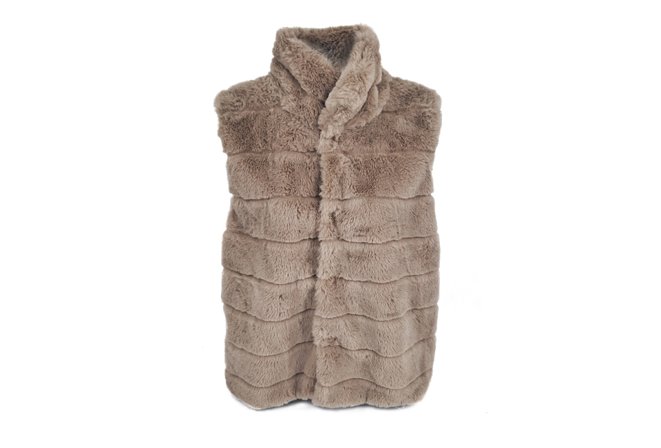 Soft women's faux fur body warmer